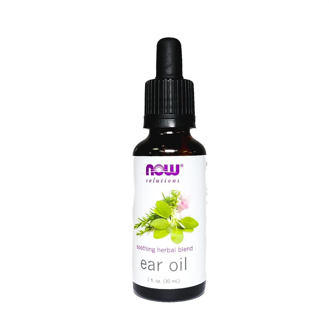 NOW ear oil bottle with black dropper cap and green herbs on a white background