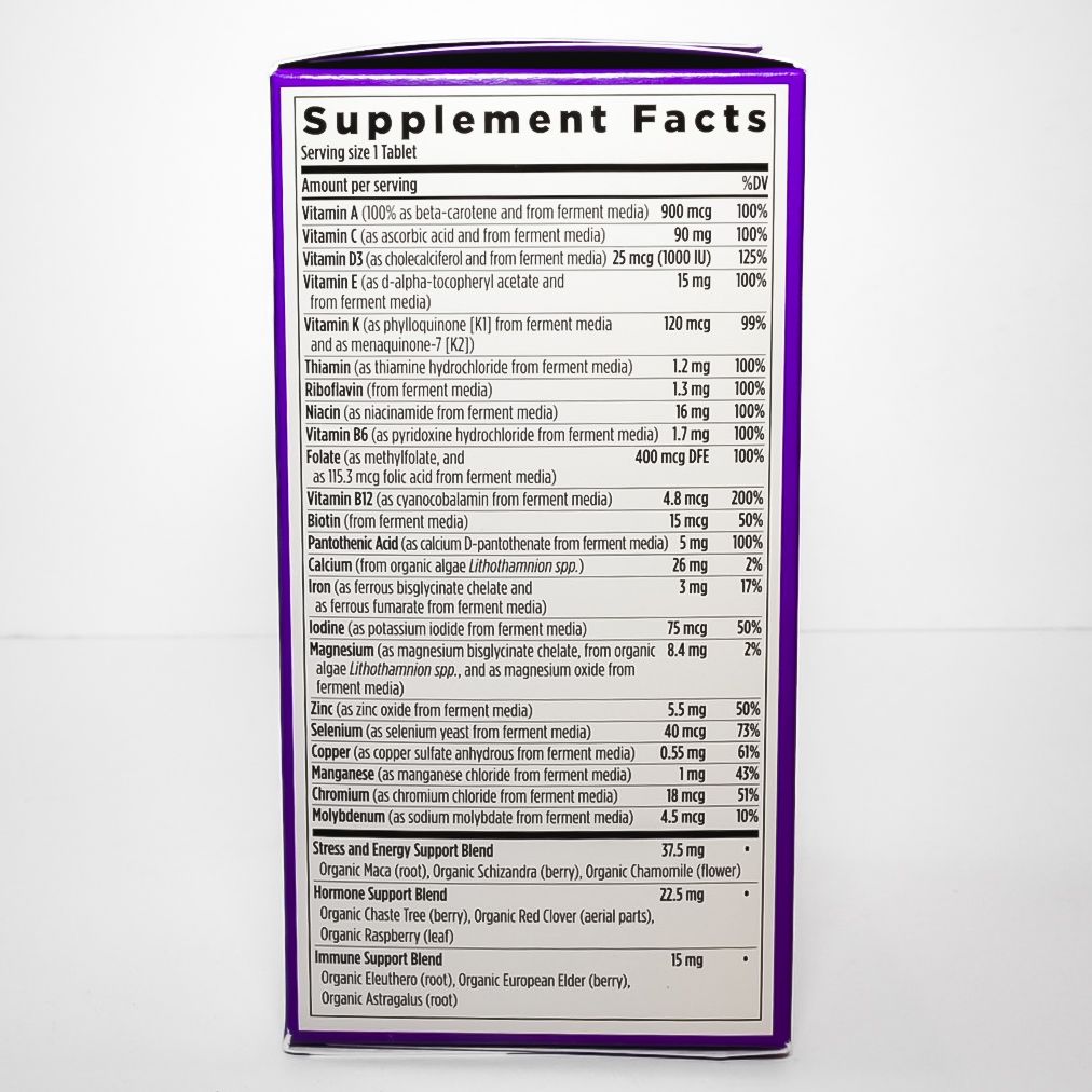 Purple supplement facts label on a white bottle, listing ingredients and nutrition amounts.