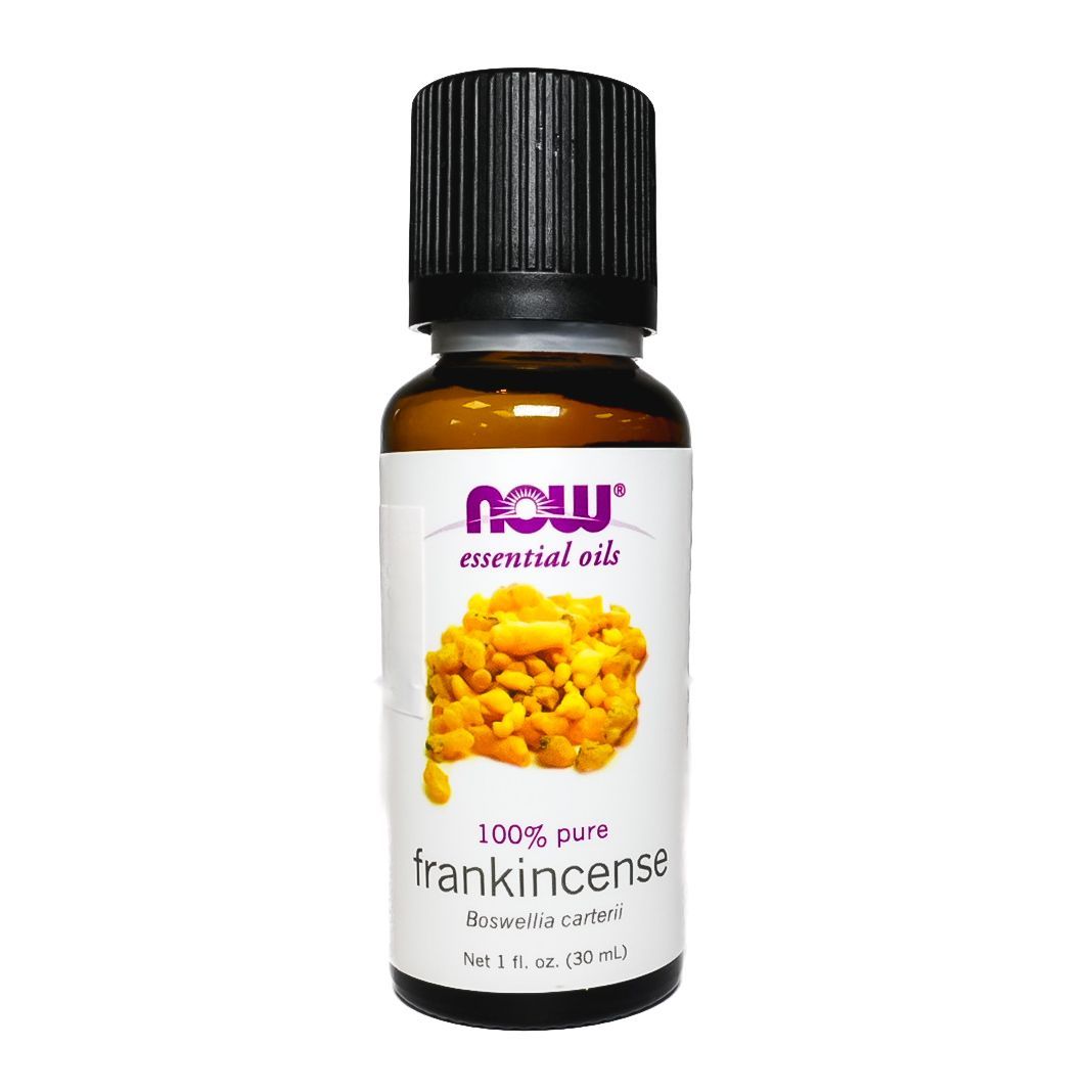 NOW Essential Oils frankincense bottle with black cap and yellow label on white background