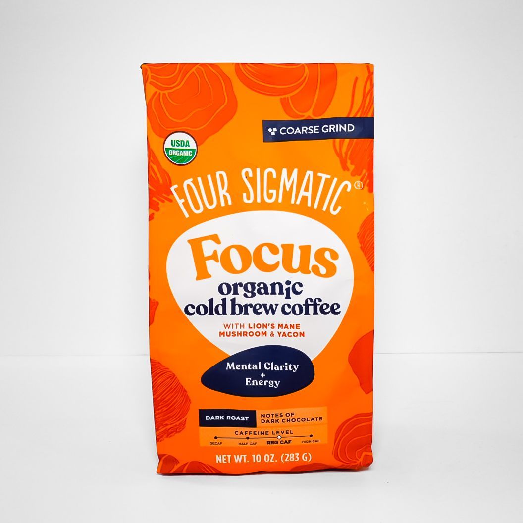 Orange bag of Four Sigmatic Focus organic cold brew coffee on a white background