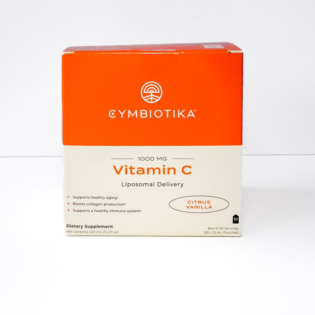 Orange and white Cymbiotika Vitamin C supplement box on a white background