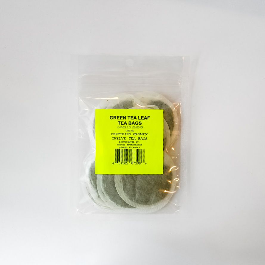 Plastic bag of green tea leaf tea bags with a bright yellow label on a white background