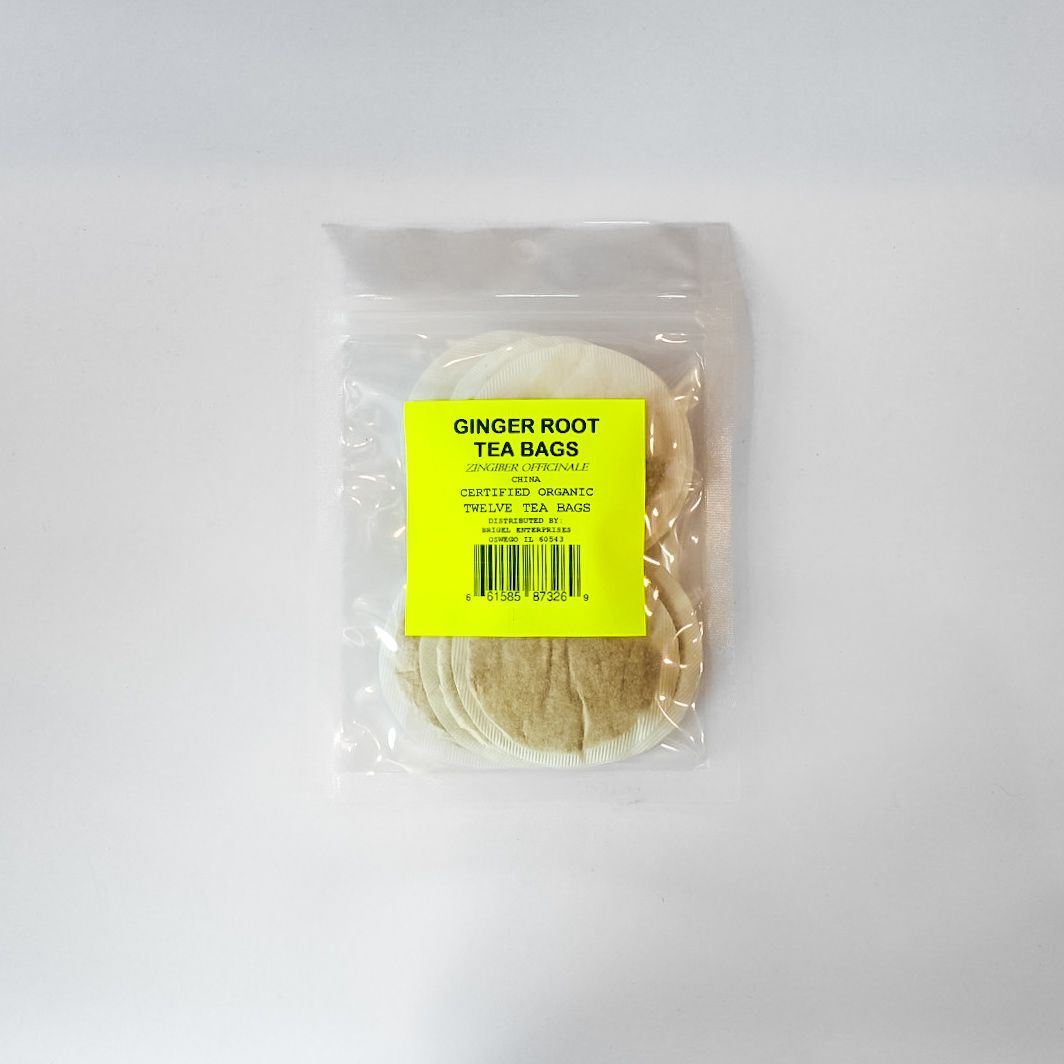 Clear bag of round tan tea bags with a bright yellow label on a white background