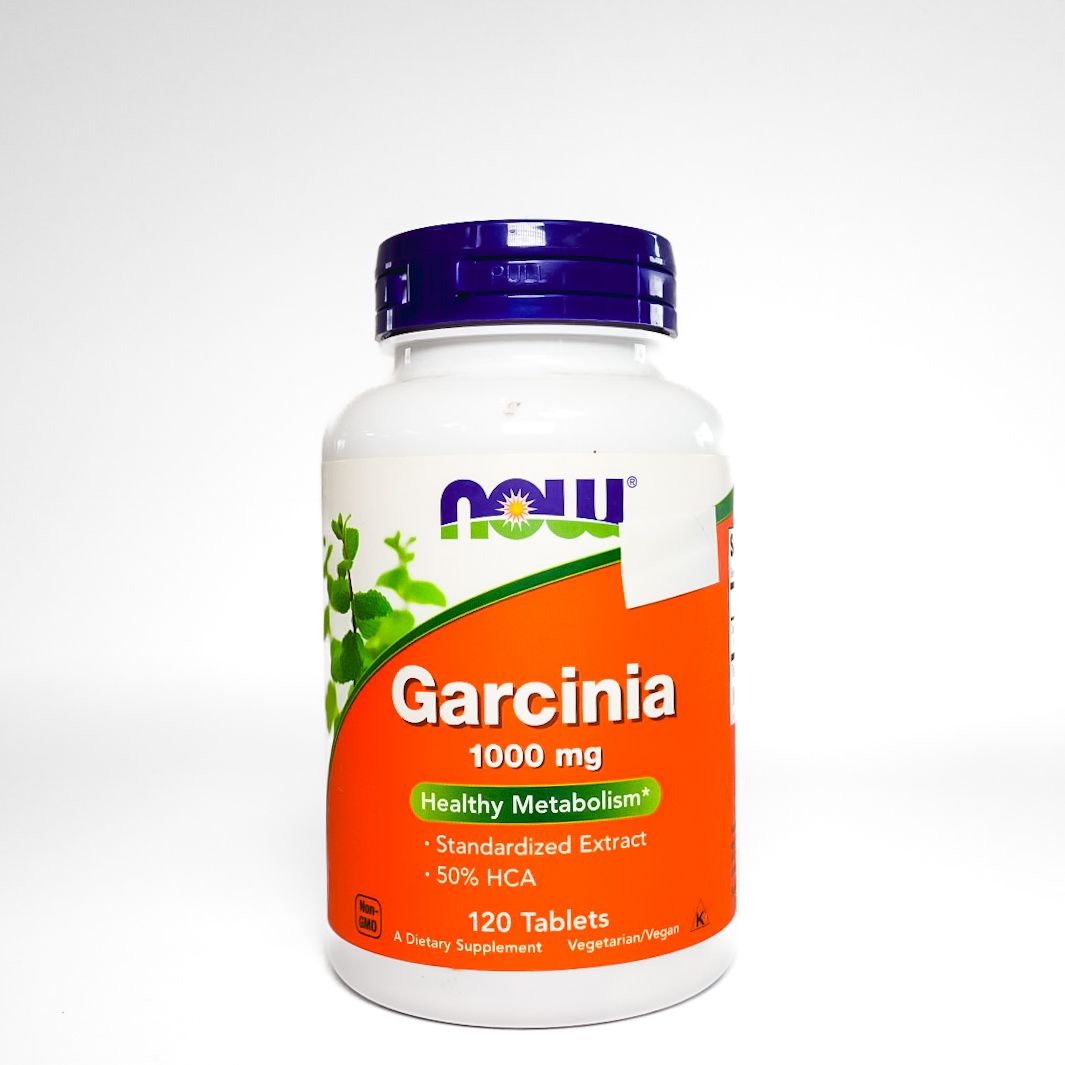 NOW Garcinia 1000 mg dietary supplement bottle with orange label and purple cap