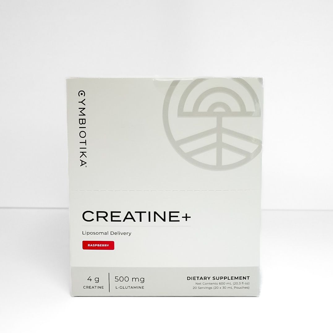 White supplement box labeled “CREATINE+” with a gray logo on a plain background