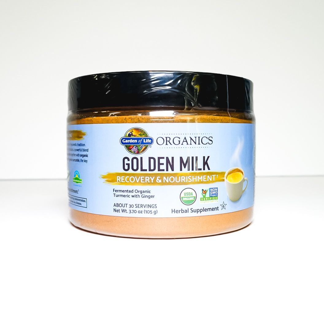 Gold Organics Golden Milk Turmeric powder jar with black lid on white background