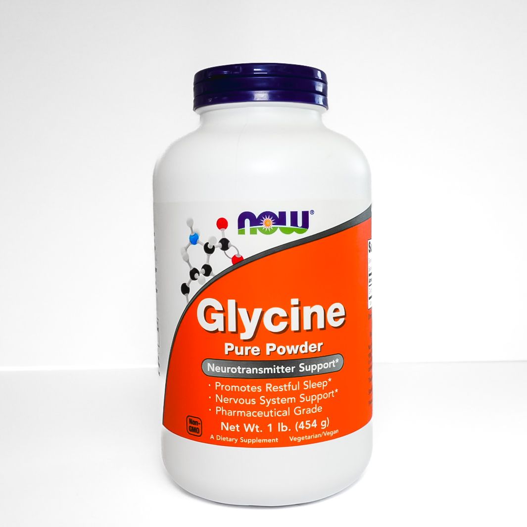 White bottle of NOW Glycine pure powder with orange label and purple cap
