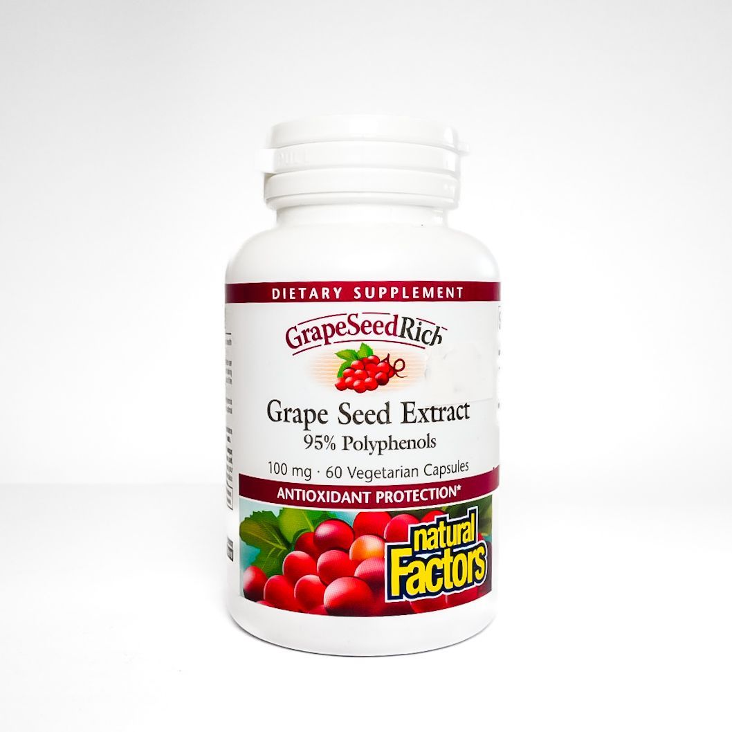 Bottle of Nature’s Factors grape seed extract dietary supplement with white label and red accents
