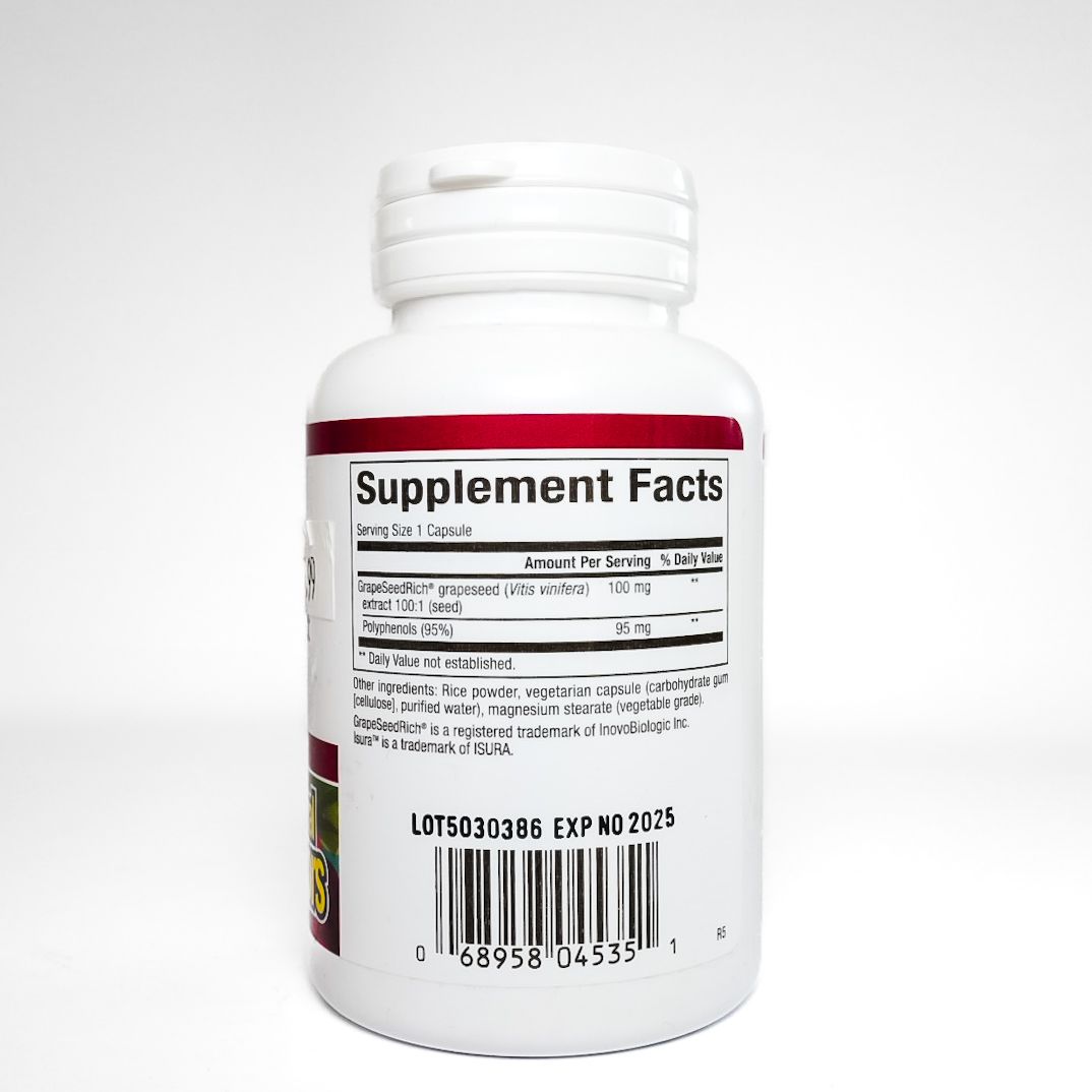 Bottle of Nature’s Factors grape seed extract dietary supplement with white label and red accents