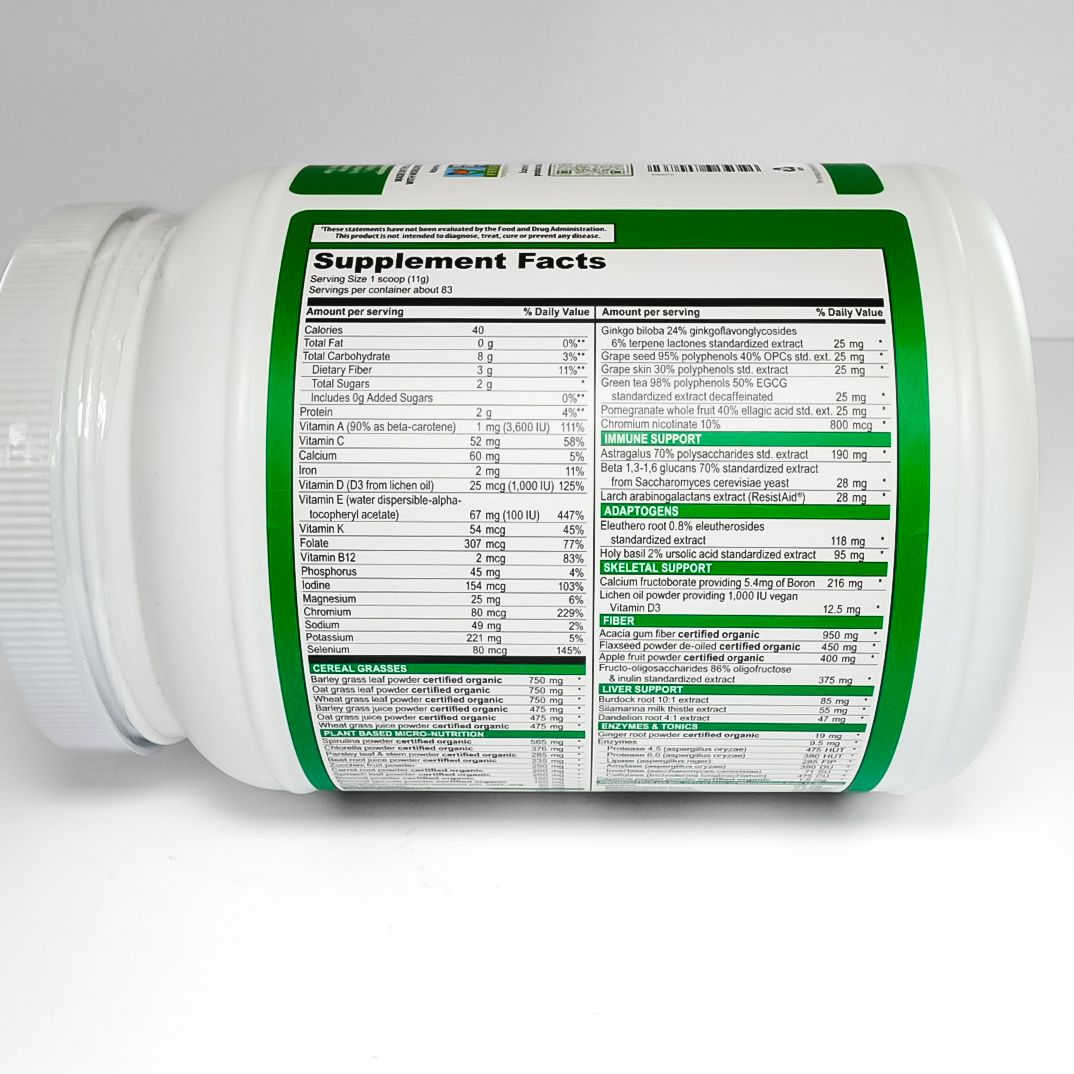 White jar of Green Vibrance probiotic powder with green and red label on a plain background