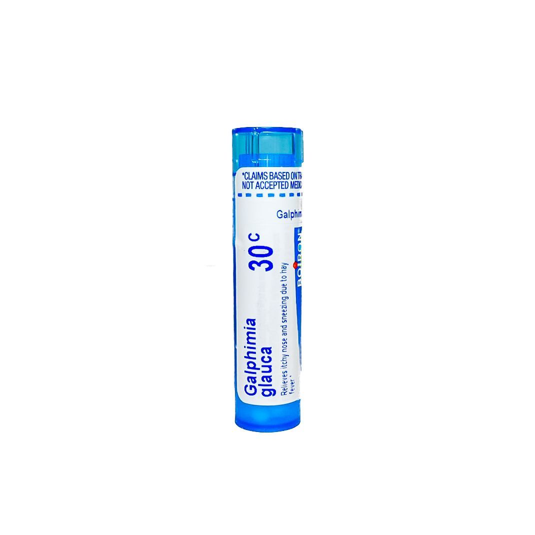 Blue-capped clear medicine vial on a white background.
