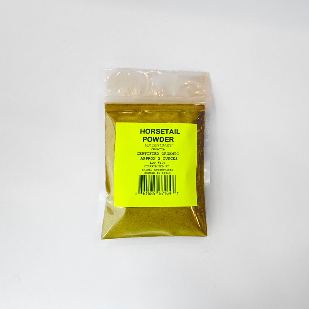 Small clear plastic pouch of horsetail powder with a bright yellow label on a white background