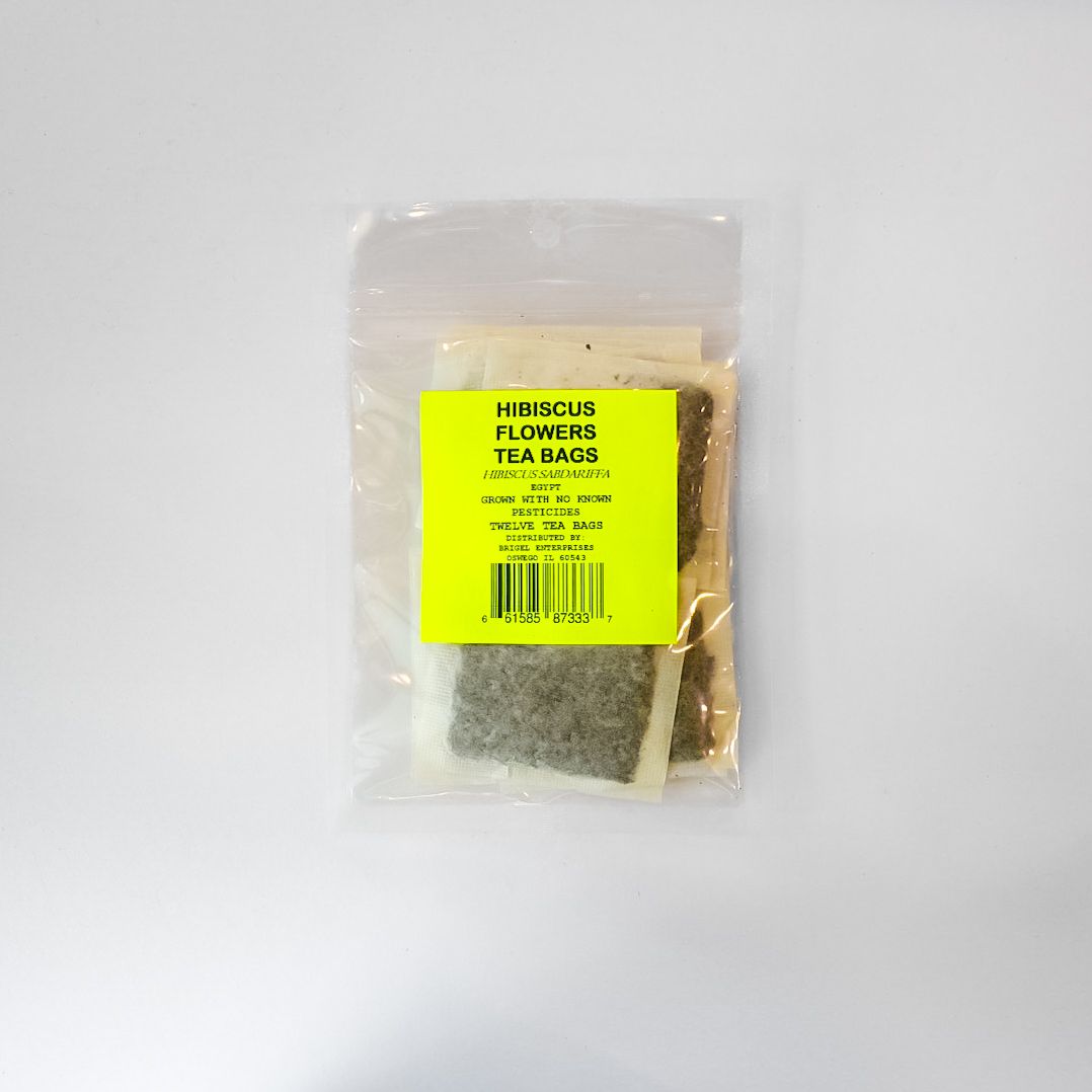 Plastic bag of loose-leaf tea with a bright yellow label on a white background