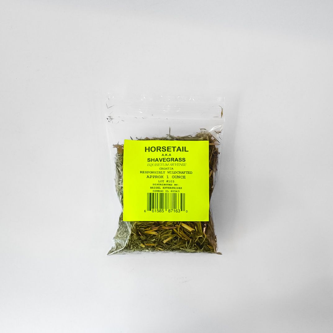 Clear plastic package of dried horsetail herbs with a bright yellow label on a white background