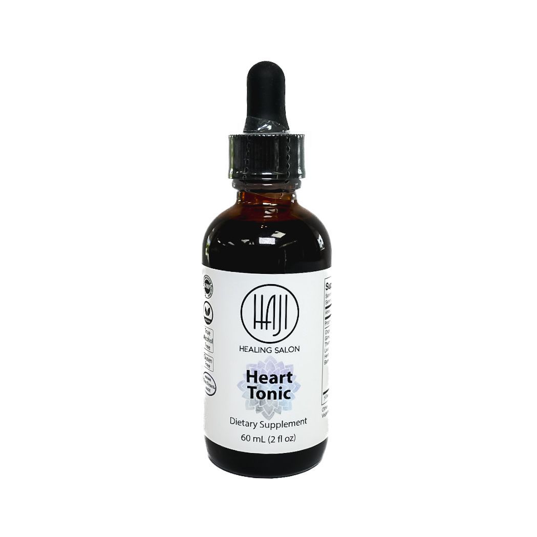 Brown dropper bottle labeled “Heart Tonic” with a white label on a plain background