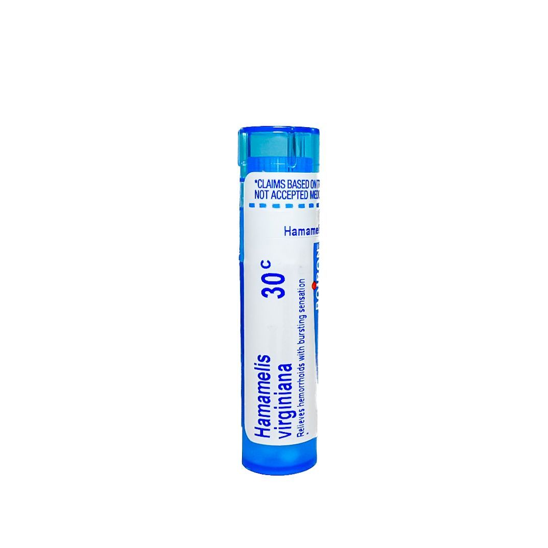 Blue and white medicine vial labeled “Harmelis Ignatia 30C” on a white background