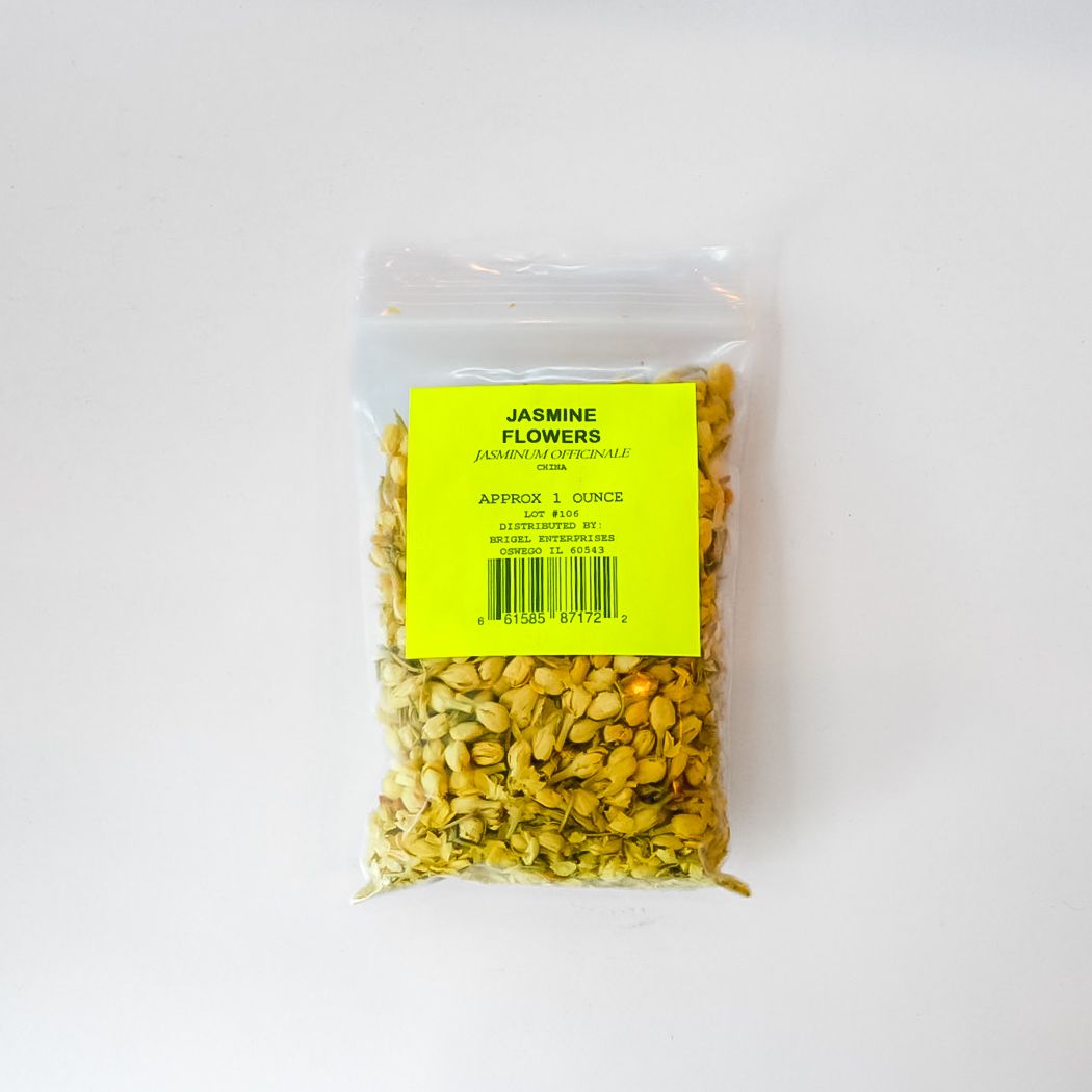 Clear bag of dried flowers with bright yellow label on a white background