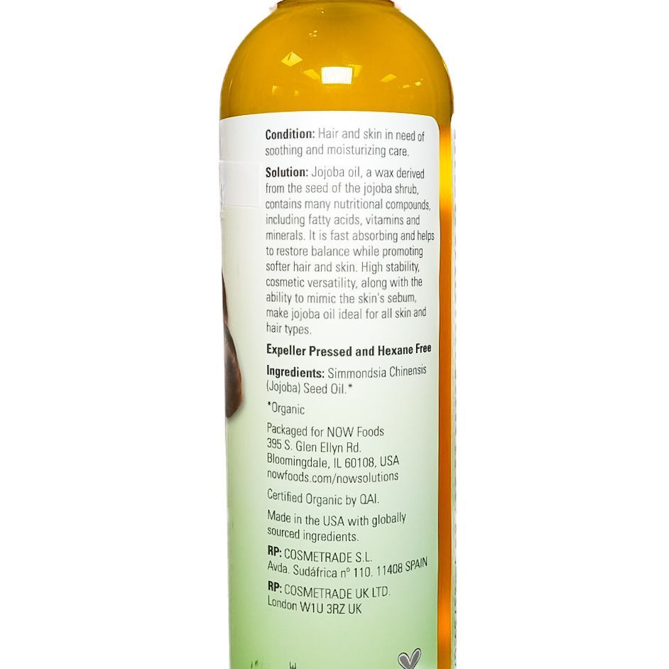 Bottle of NOW Solutions cocoa butter oil with cocoa bean image on the label, white and amber bottle.