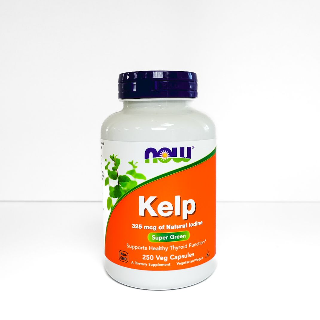 NOW Kelp dietary supplement bottle with white label, orange panel, and dark blue cap