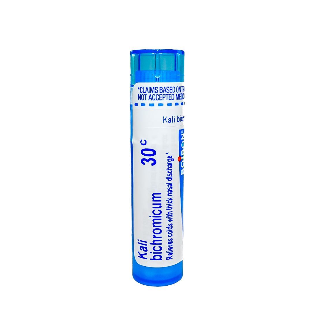 Blue-and-white medicine vial labeled Potassium dichromate, standing upright