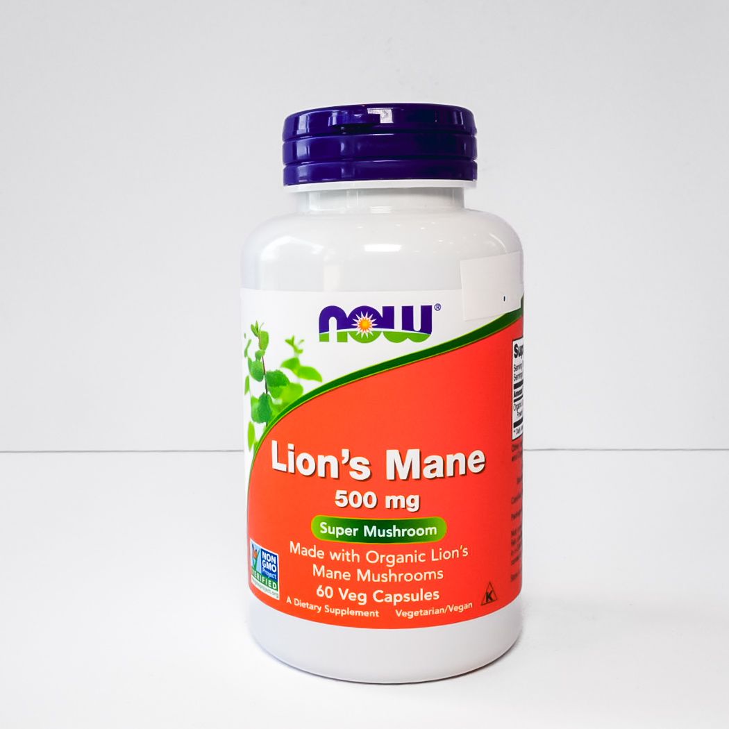 NOW Lion’s Mane 500 mg supplement bottle with white body, red label, and purple cap