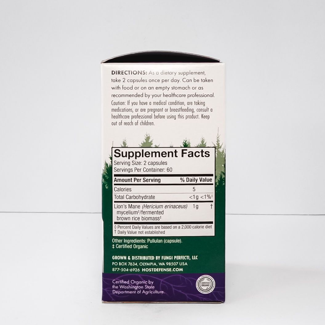 Host Defense Lion's Mane mushroom supplement box, white and purple with forest graphic, memory and nerve support