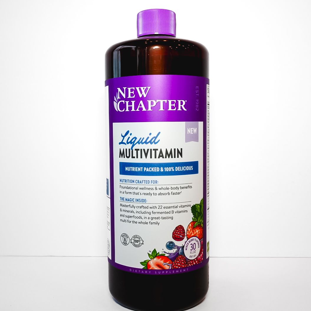 Black bottle of New Chapter Liquid Multivitamin with purple cap and label on a white background