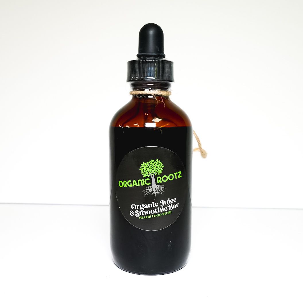 Amber dropper bottle labeled “Organic Roots” on a white background