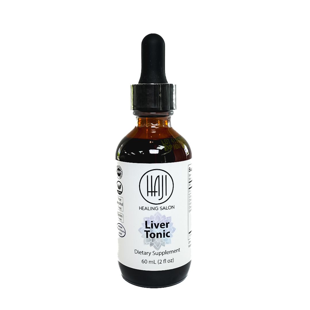 Amber dropper bottle labeled “Liver Tonic” with a white label and black cap on a white background
