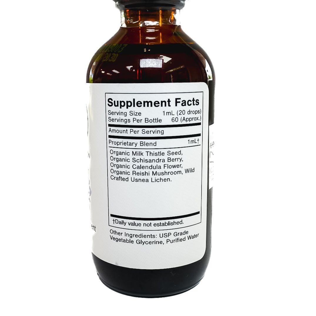 Amber dropper bottle labeled “Liver Tonic” with a white label and black cap on a white background
