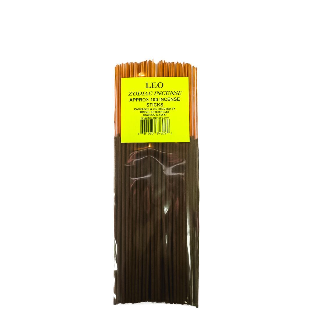 Bundle of brown incense sticks with a yellow label, isolated on a white background