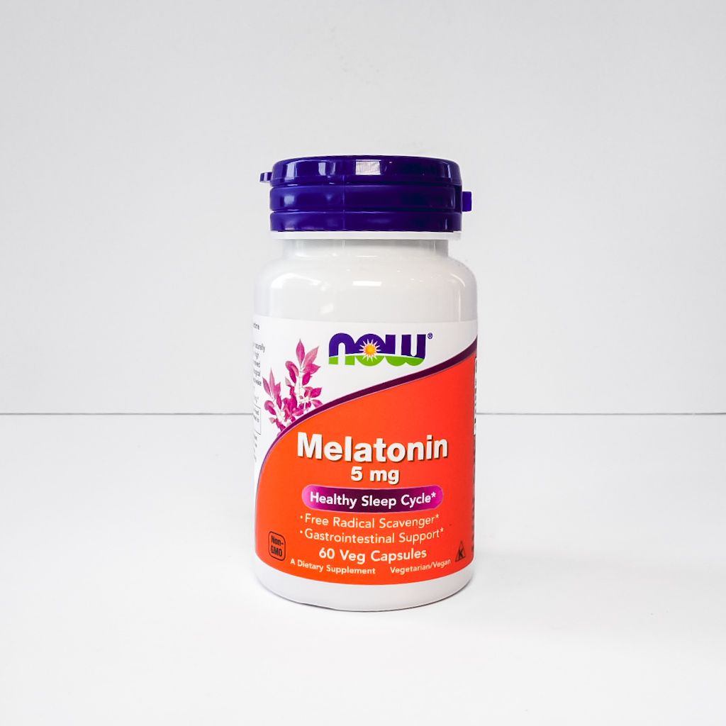 Now Melatonin 5 mg supplement bottle with purple cap and orange label