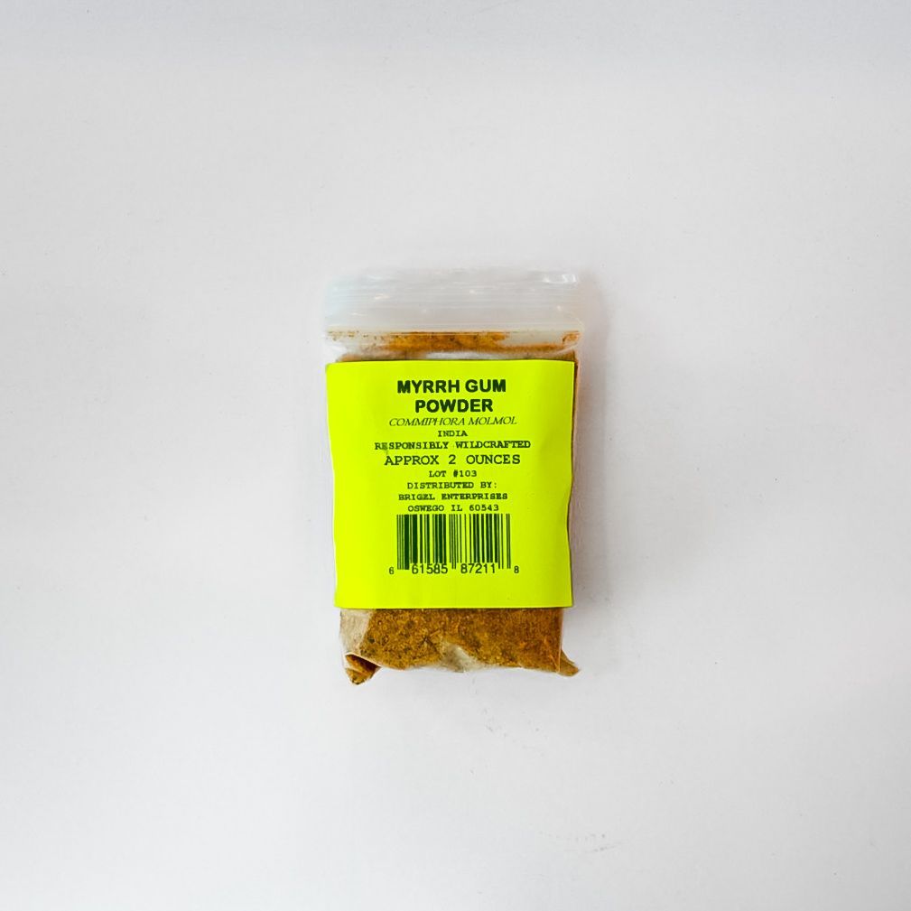 Clear jar of yellow myrrh gum powder with a bright green label on a white background