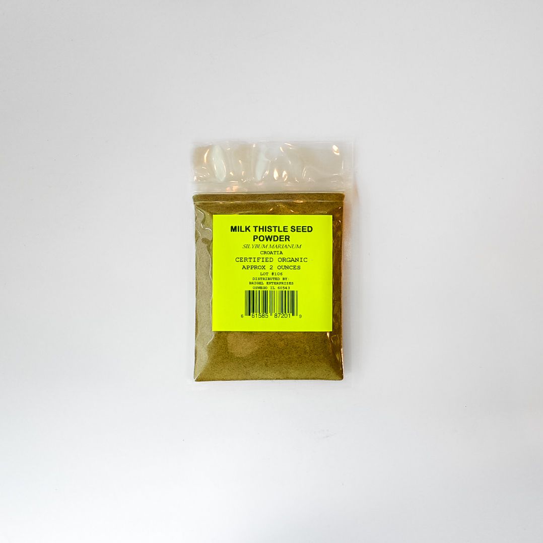 Small clear plastic bag of yellow powder with a bright yellow label on a white background