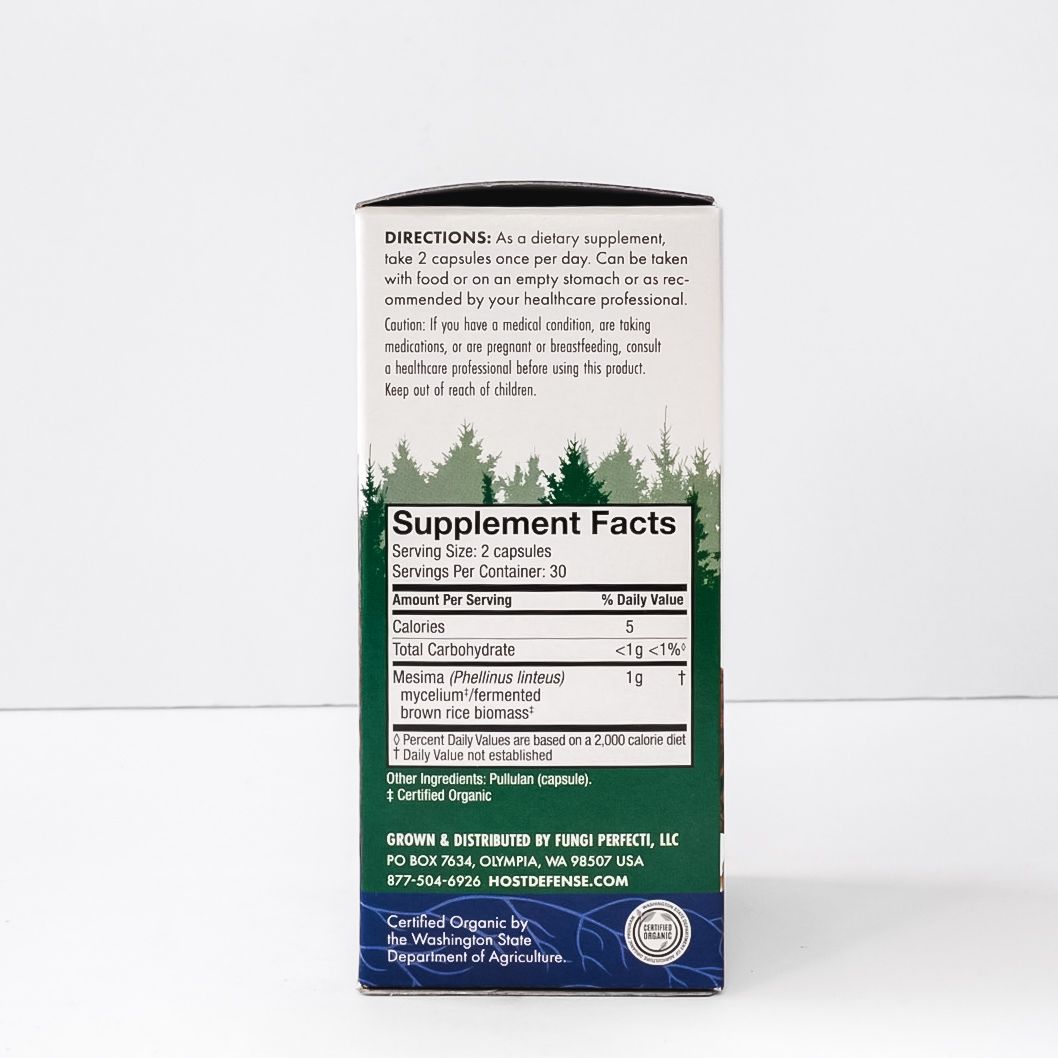 Mushroom supplement box labeled “MESIMA” with red-orange mushrooms and green forest graphic