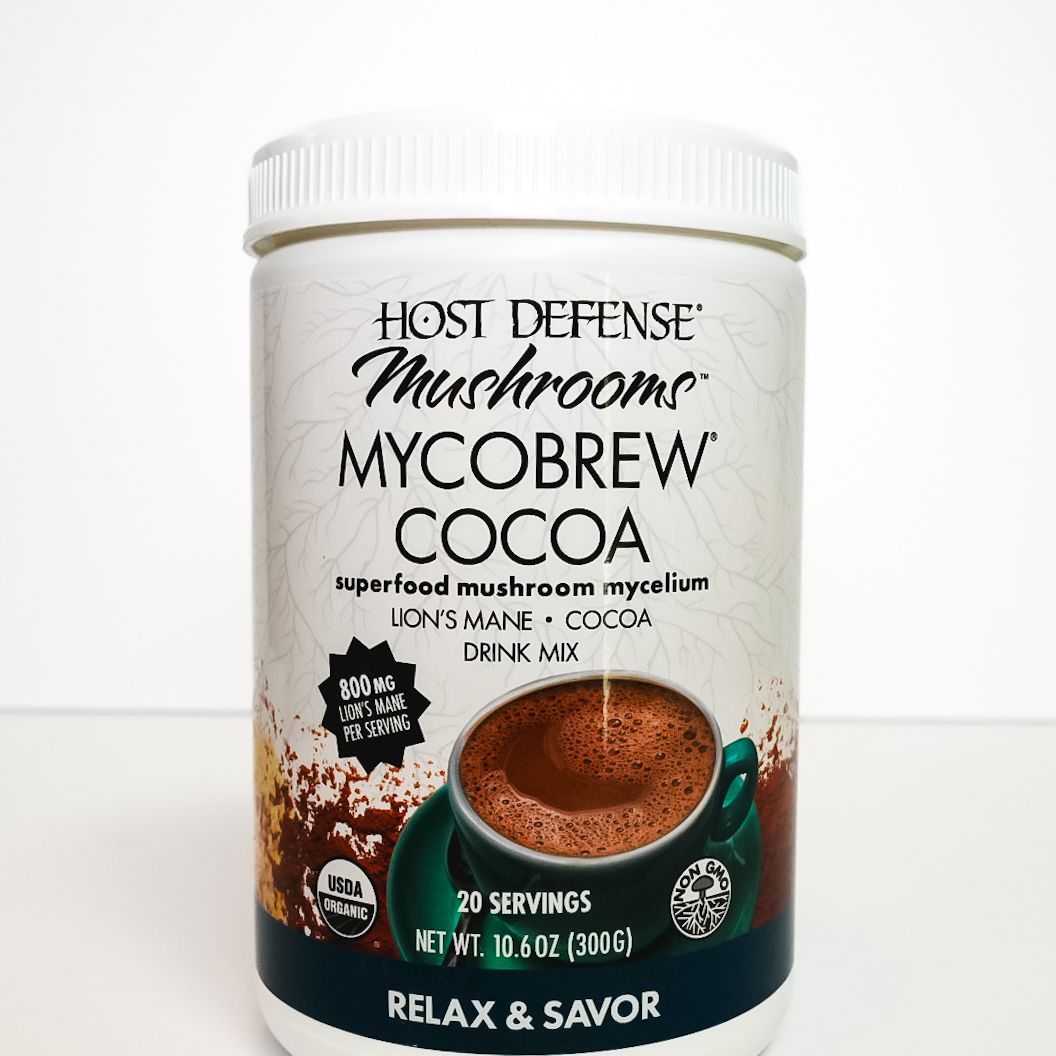 Host Defense MycoBrew Cocoa mushroom drink mix jar with white lid and dark label