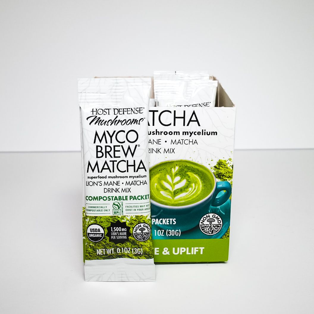 Myco Brew Matcha and matcha latte packaging with green swirl on a white background