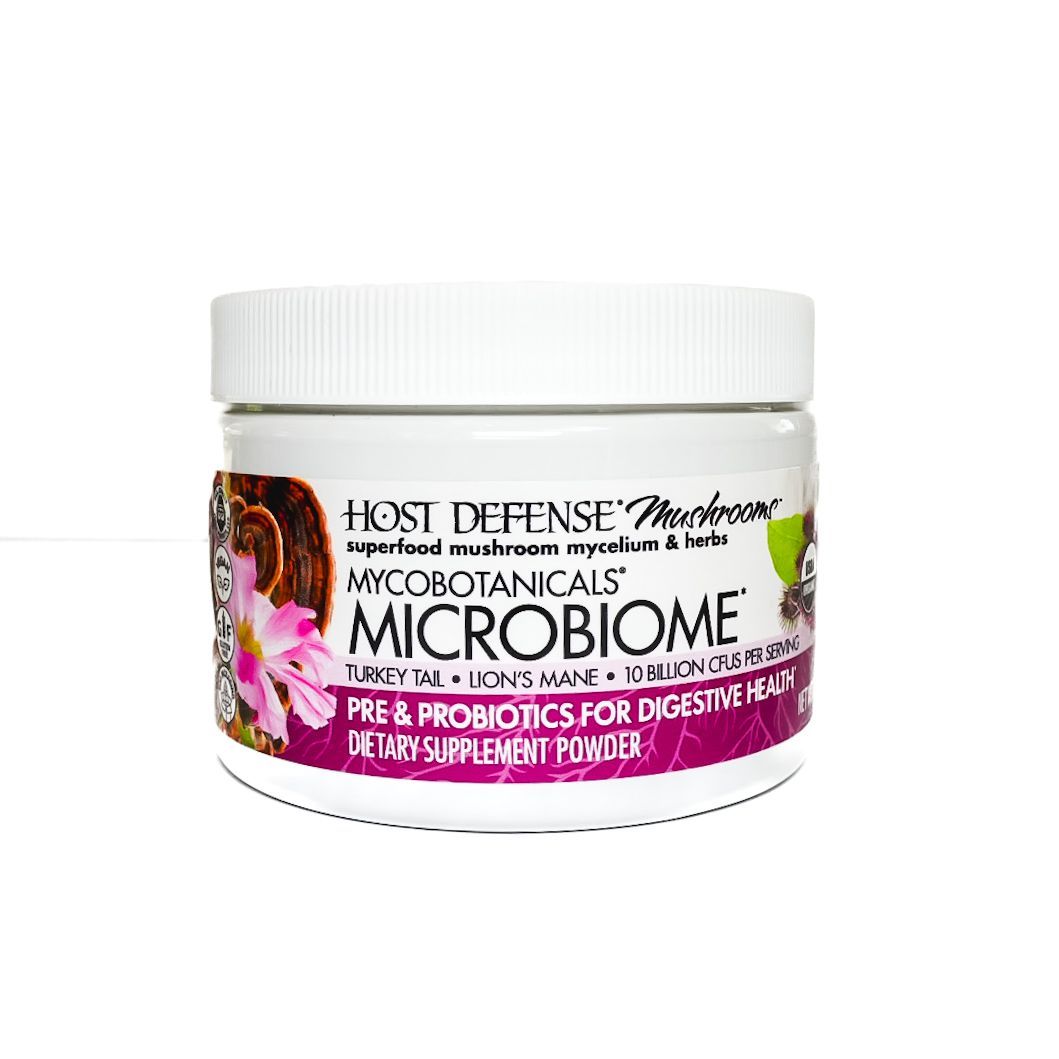 White jar of Host Defense MycoBiome prebiotic + probiotics supplement powder with magenta label