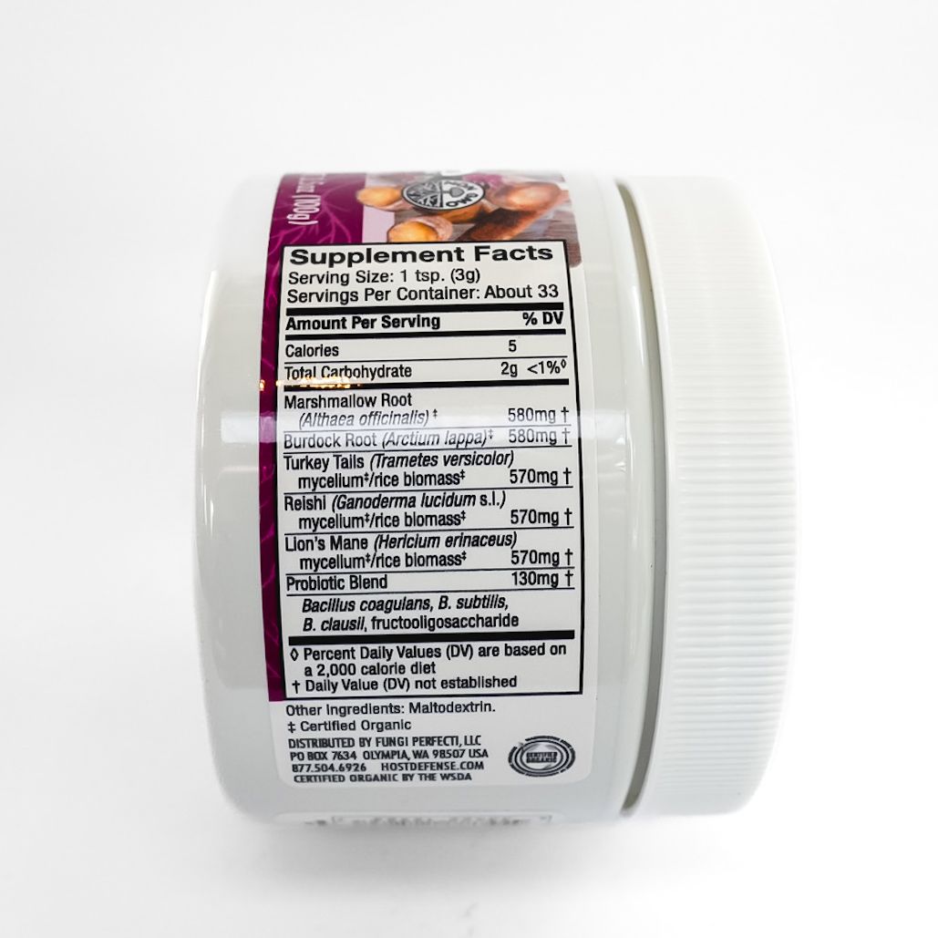 White jar of Host Defense MycoBiome prebiotic + probiotics supplement powder with magenta label