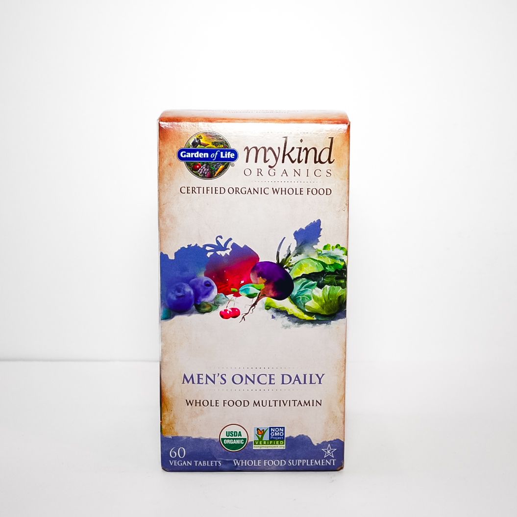 Centrum multivitamin box with colorful splash design on a white background