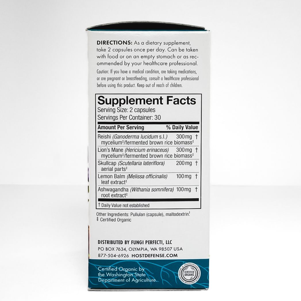 Box of Host Defense Mushrooms “Stress Decompress” supplement with purple flowers and berries on the label