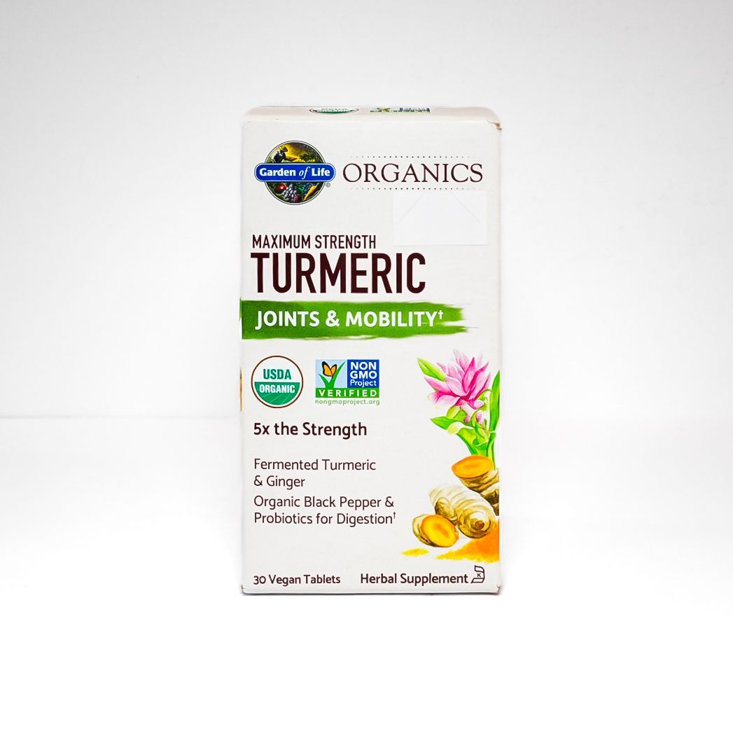 Turmeric supplement bottle labeled “Joints & Mobility” with flowers and turmeric roots on a white background