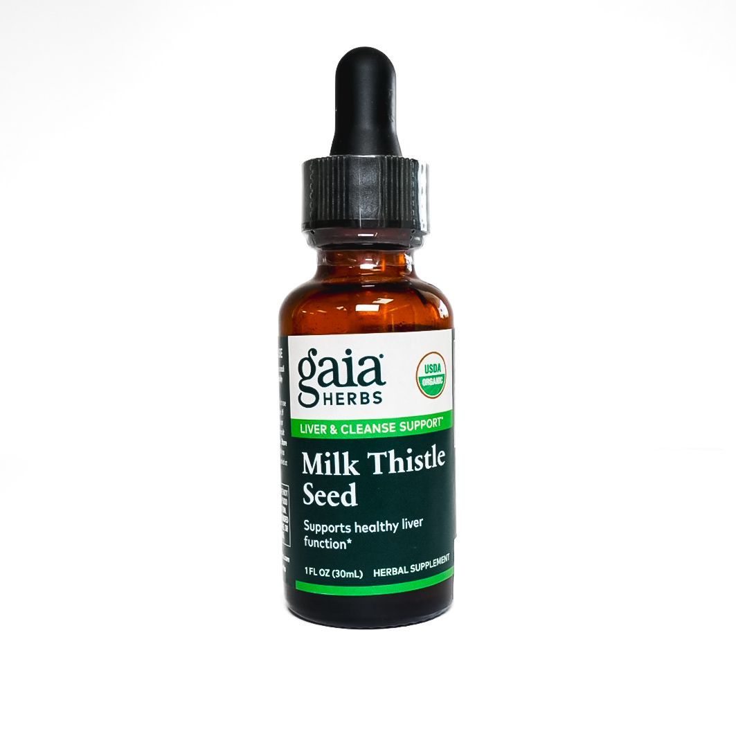 Brown glass dropper bottle labeled “Milk Thistle Seed” on a white background