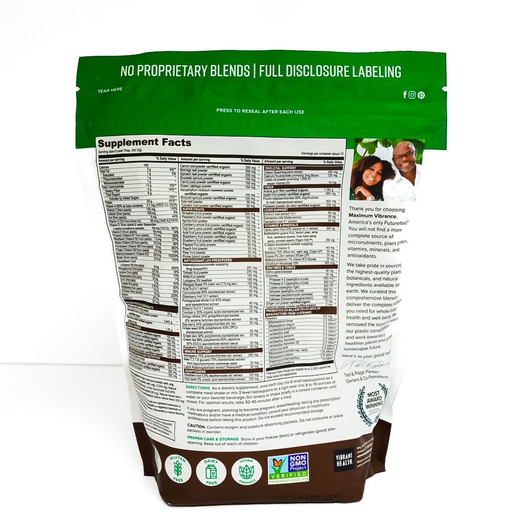 Green-and-white bag of Maximum VIBRANCE pet food with brown kibble illustration