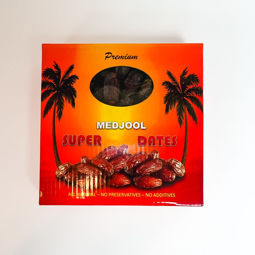 Orange Medjool dates package with palm trees and dates pictured on the front
