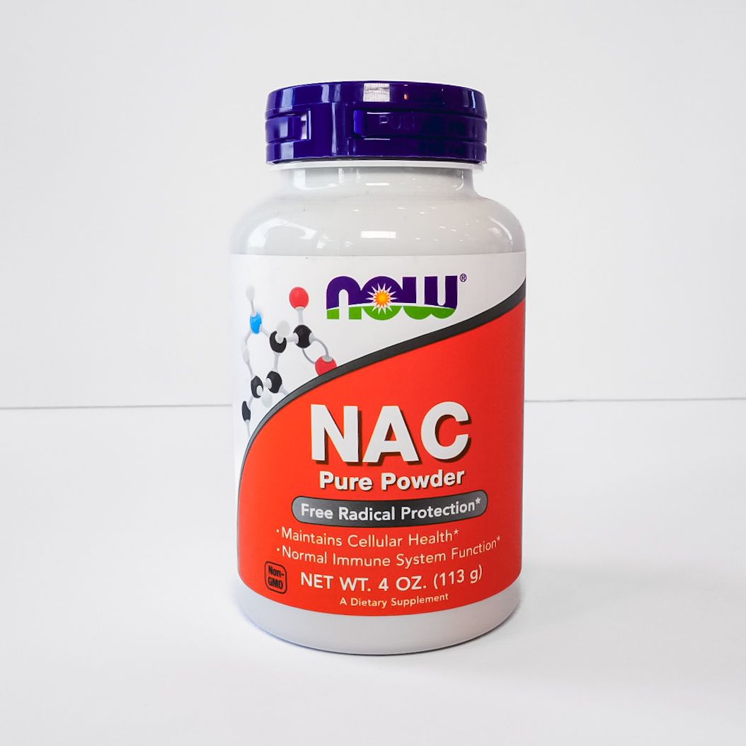 NOW NAC Pure Powder supplement bottle with purple cap and red label on a white background