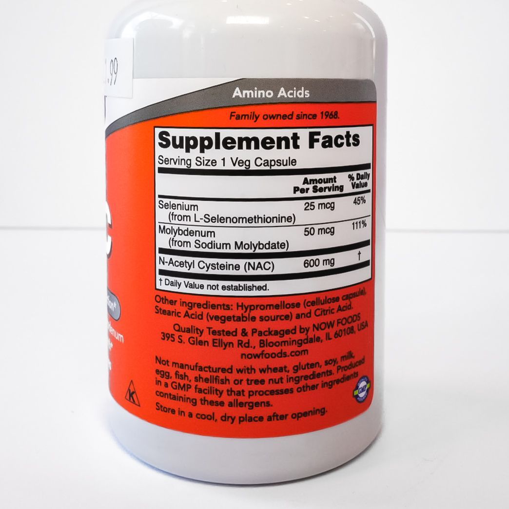 NOW NAC 600 mg supplement bottle with purple cap and red label on a white background