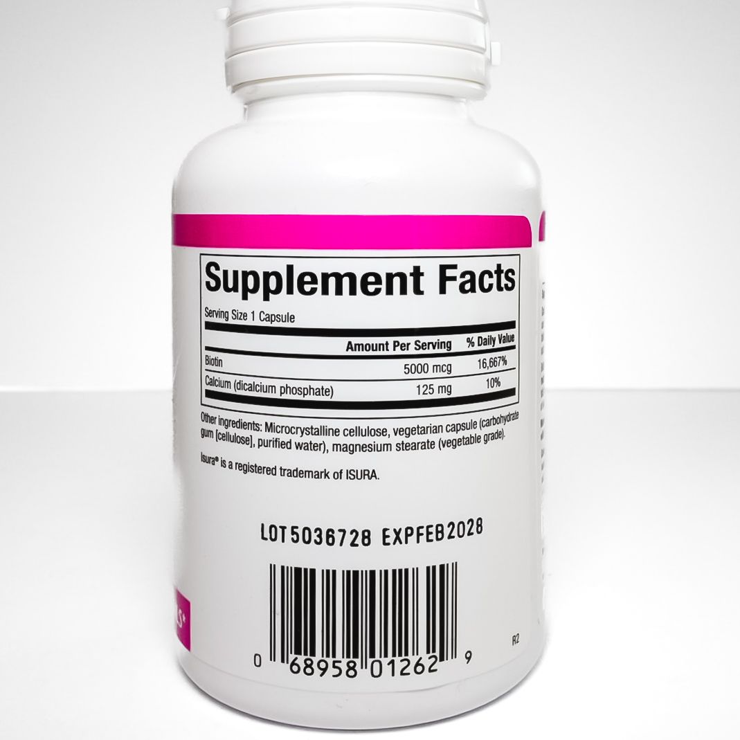 Natural Factors Biotin 5000 mcg dietary supplement bottle with pink label