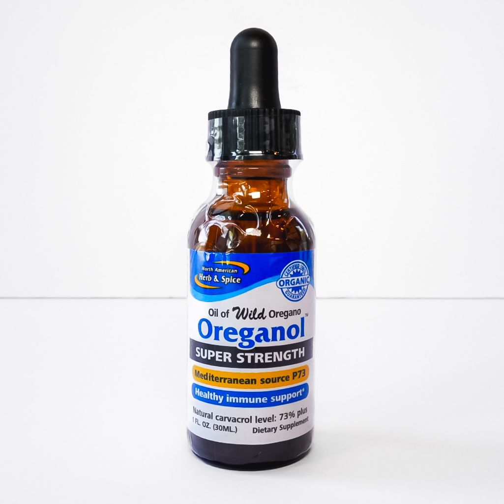 Brown dropper bottle of Oreganol Super Strength supplement with blue label