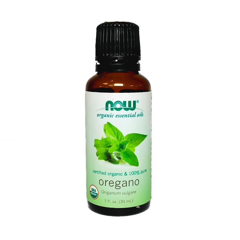 Bottle of NOW oregano essential oil with green label and black cap